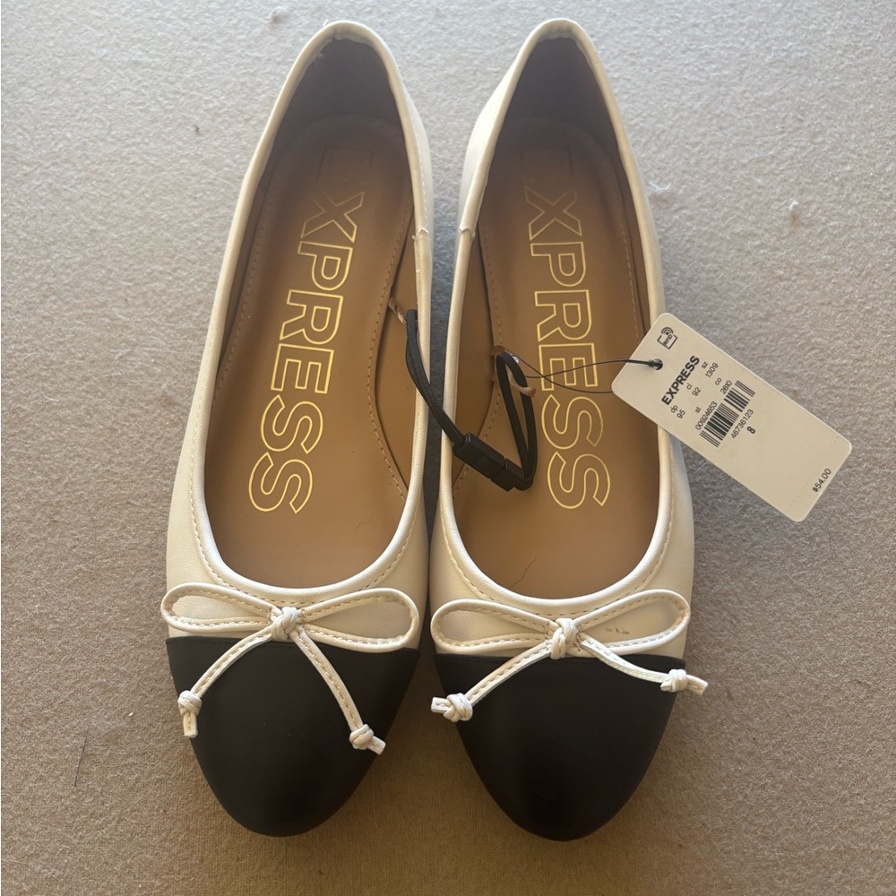 Express Black and White Flats with Decorative Bows